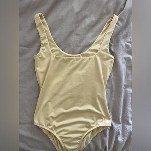 Princess Polly yellow bodysuit